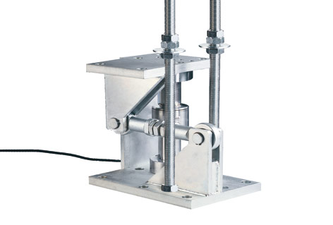 Mechanical mounting assembly for controlled load introduction.